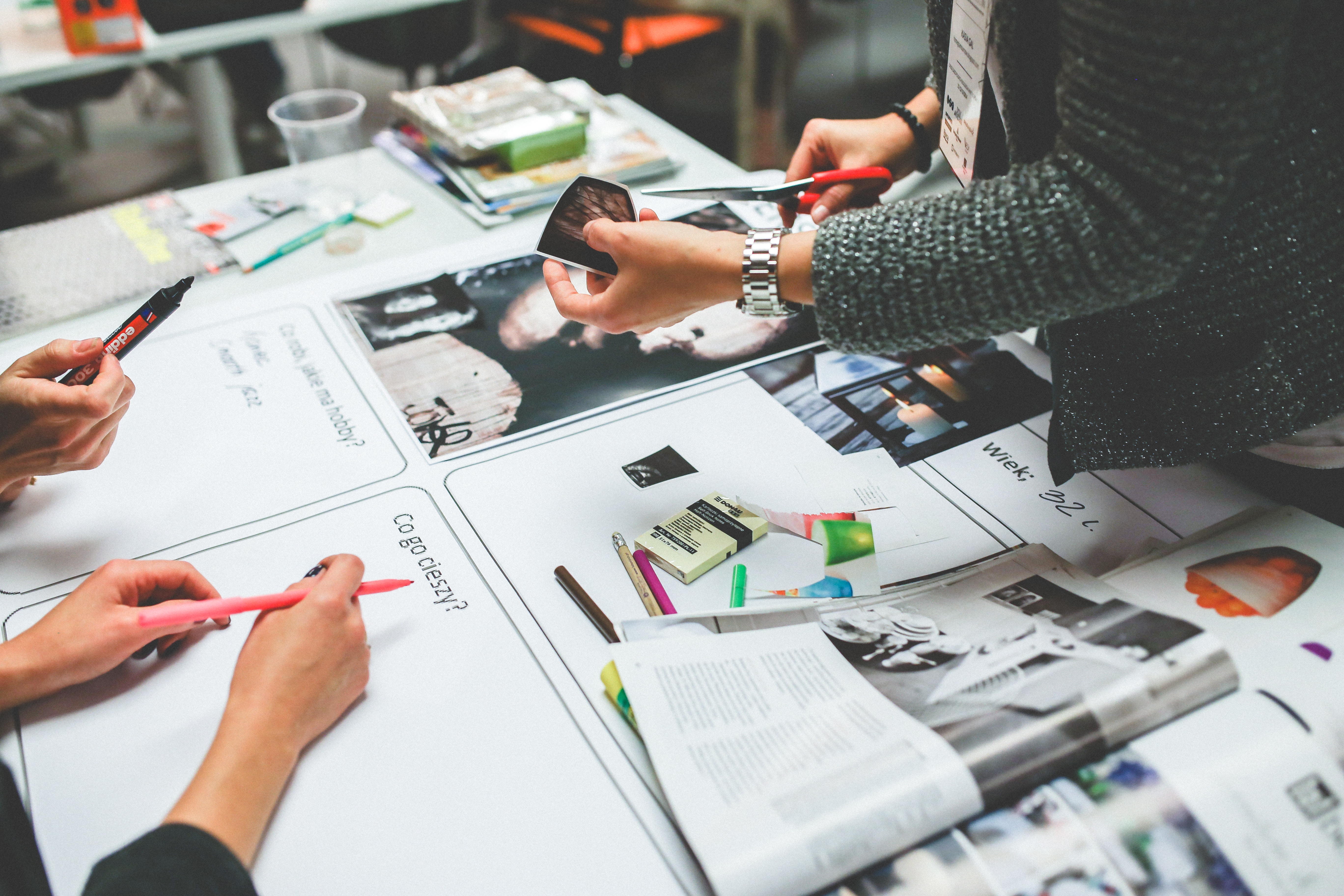 three people working on a design project