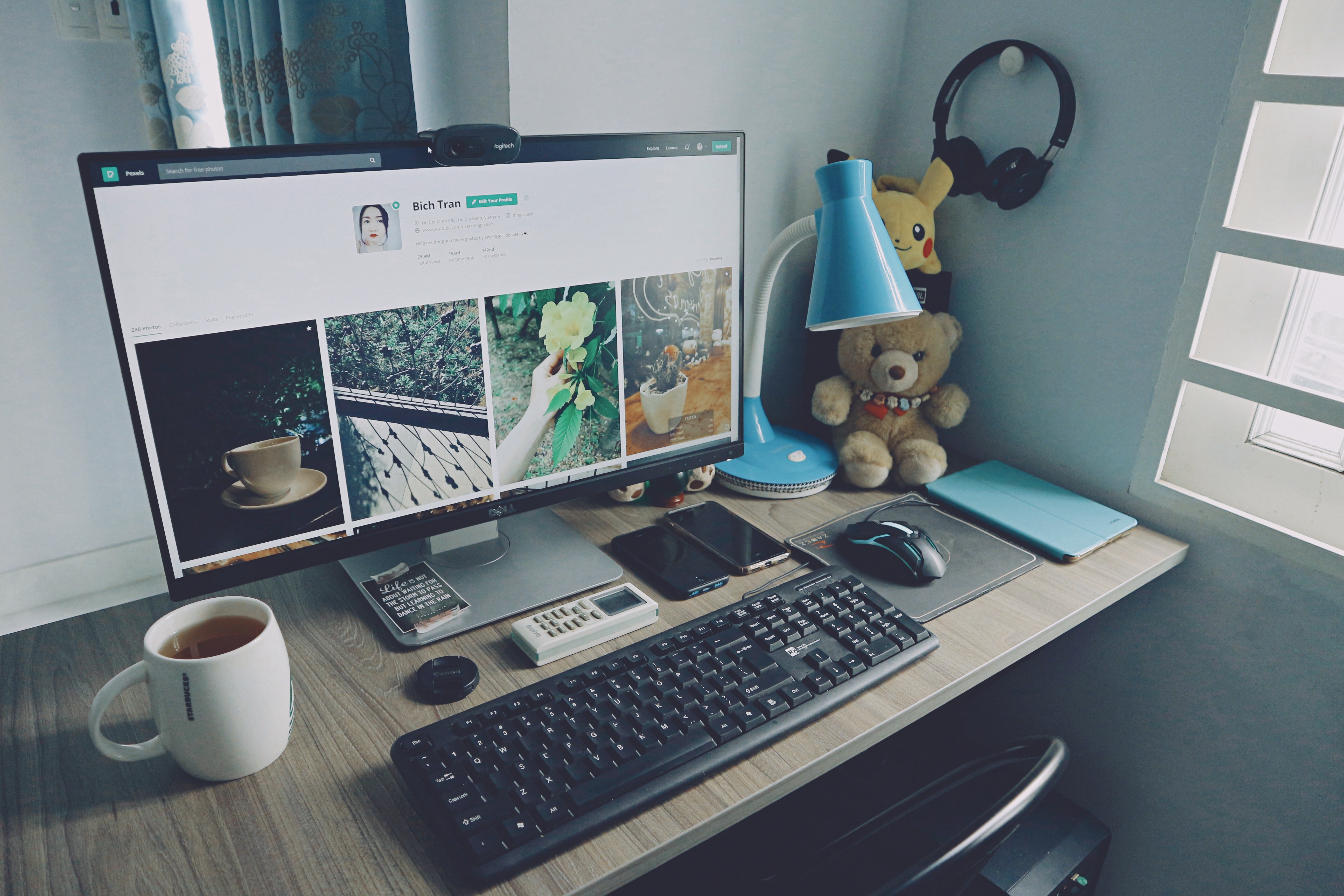 A lovely desk with a computer displaying a website.